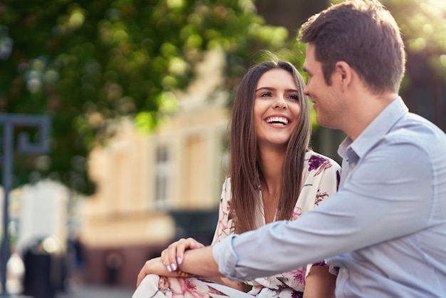 young couple dating in the park in summer