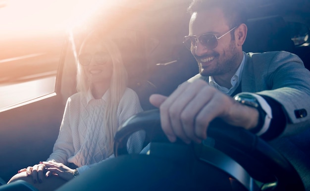 Young couple enjoying the drive