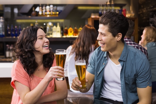 Young couple having a drink together