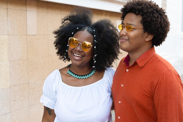 Young couple having fun in the street