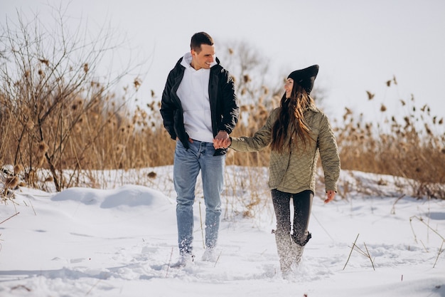 Young couple in love walking in winter time