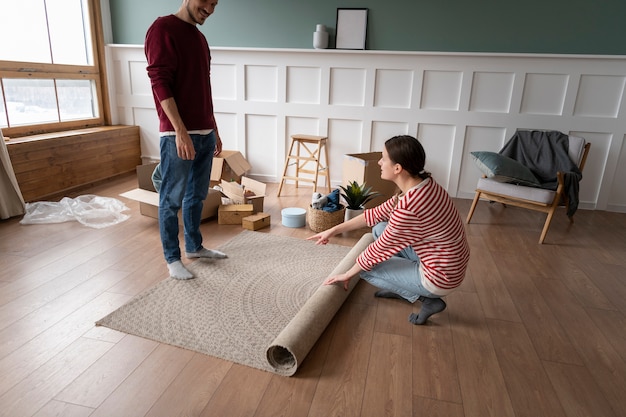 Young couple moving into a new home