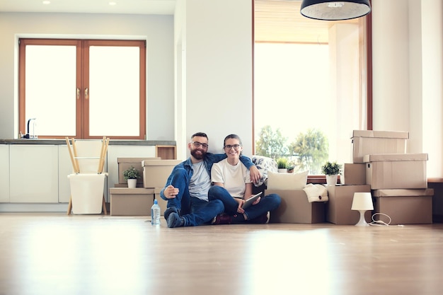 Young couple moving in to new home together