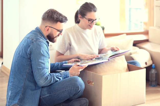 Young couple moving in to new home together