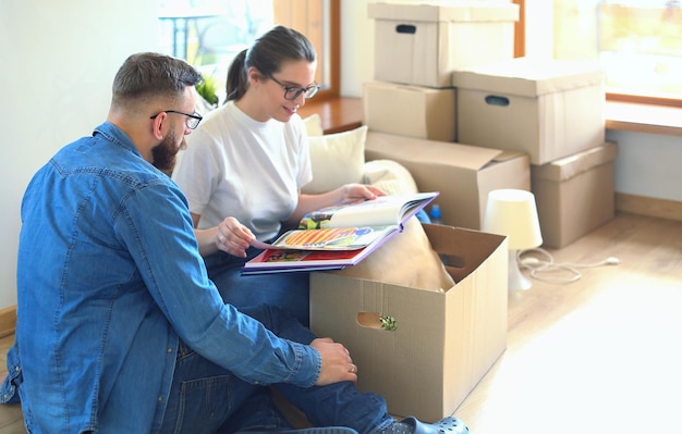 Young couple moving in to new home together