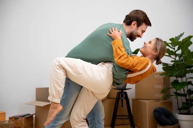 Young couple moving in new home