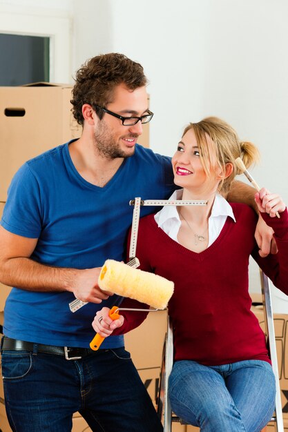 Young couple moving in new home