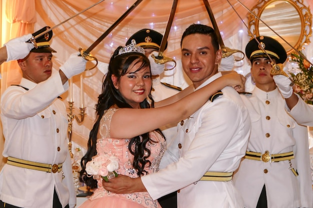 A young couple performs a romantic scene. Groom's looks