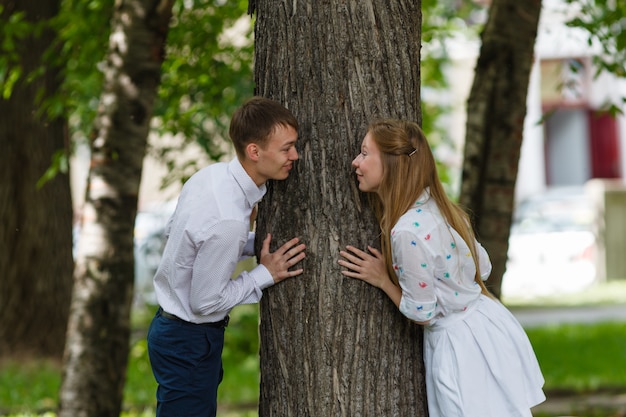 Young couple play in park