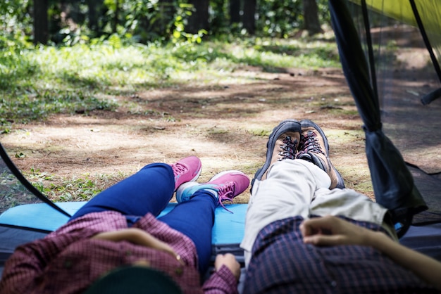 Young couple resting in tent