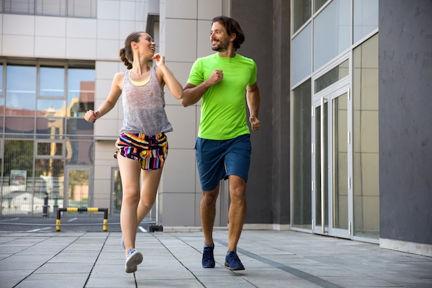 Young couple running