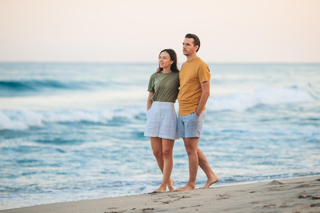 Young couple spending time together on the beach