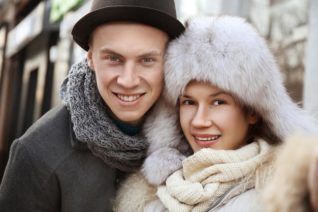 Young couple taking selfie on the street