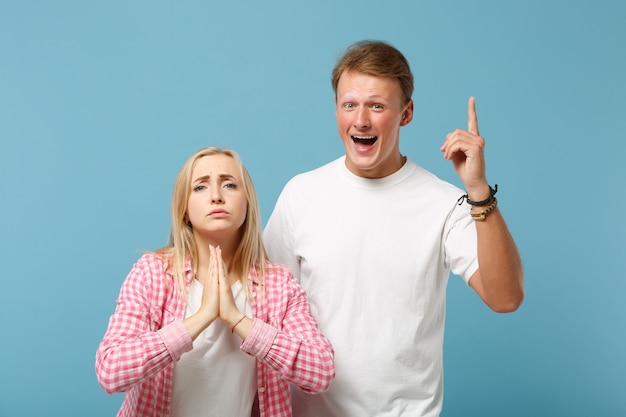 Young couple two friends man and woman  in white pink t-shirts 