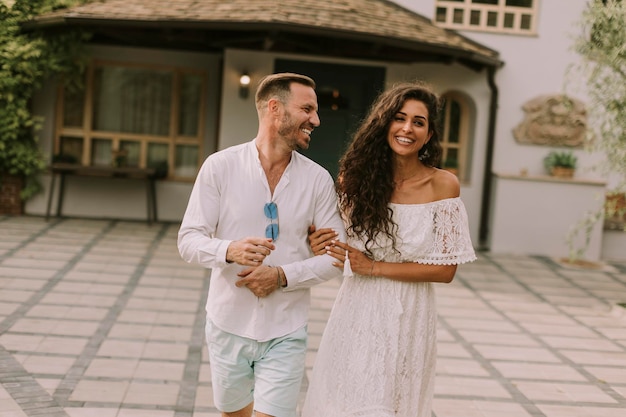 Young couple walking in the backyard