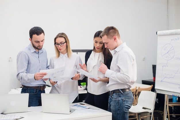 Young coworkers discussing a project