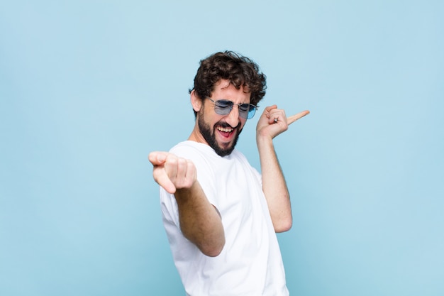 Young crazy bearded man wearing sunglasses