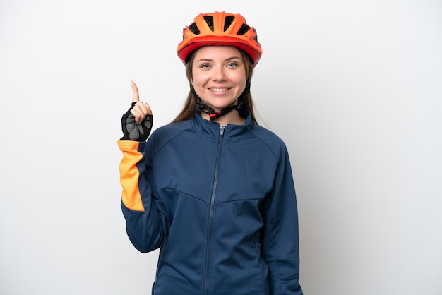 Young cyclist Lithuanian woman isolated on white background pointing up a great idea