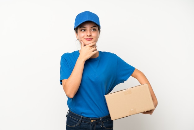 Young delivery girl laughing