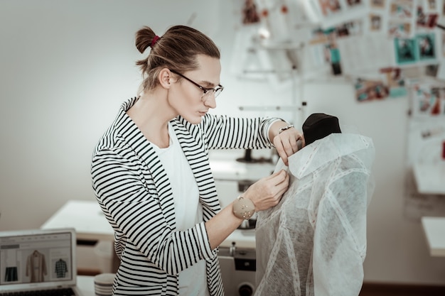 Young designer working in his studio