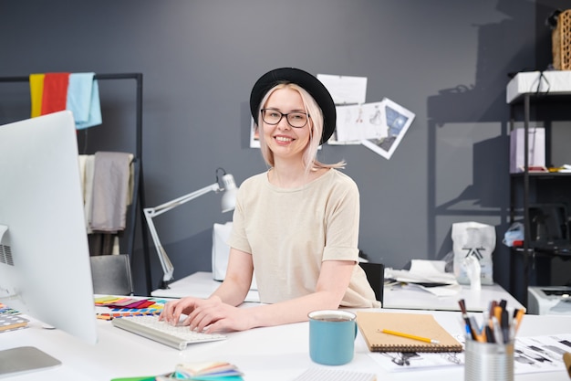 Young designer working at office