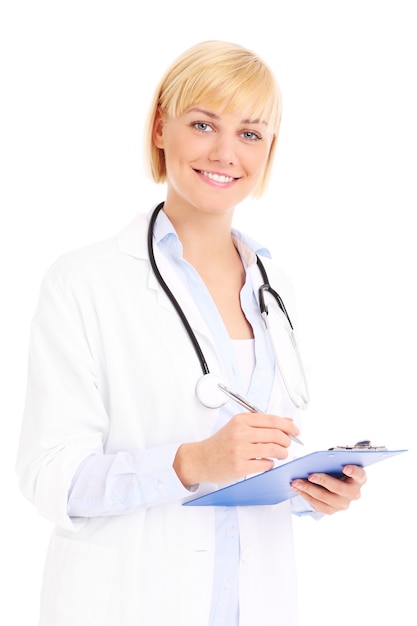 a young doctor standing with documents over white background