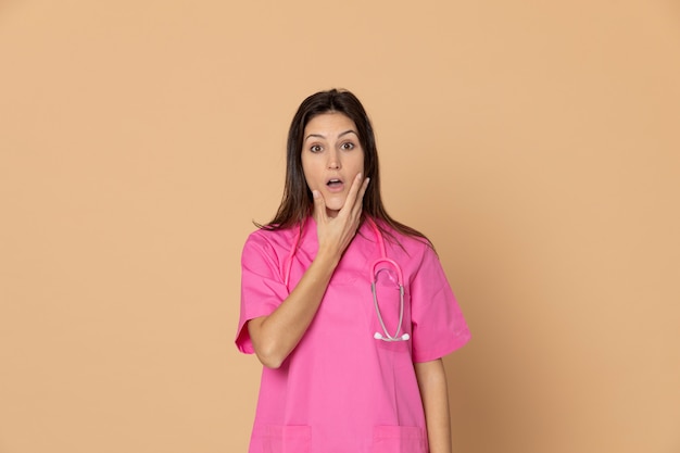 Young doctor wearing pink uniform