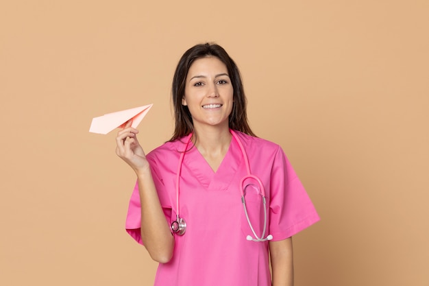 Young doctor wearing pink uniform