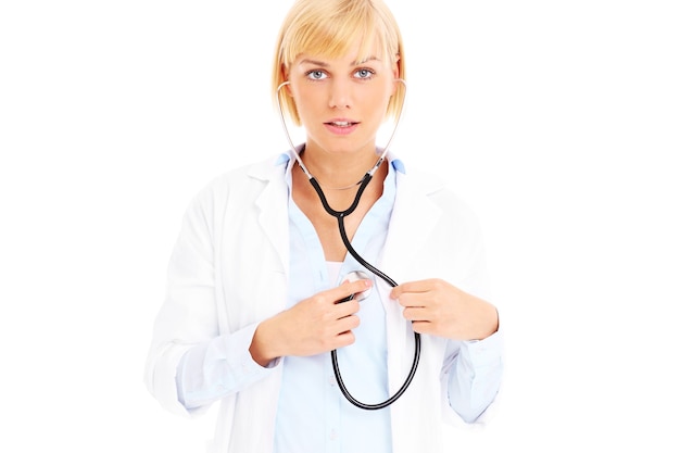 a young doctor with stethoscope checking heart over white background