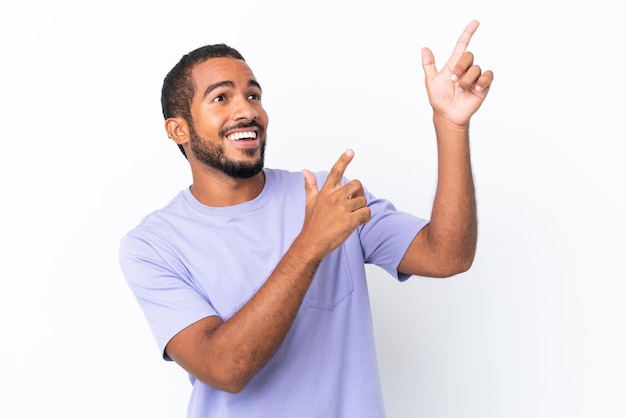 Young Ecuadorian man isolated on white background pointing with the index finger a great idea