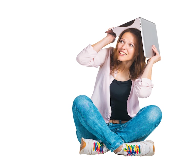 Young emotion woman with portable computer on isolated white background