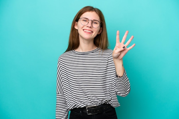 Young English woman isolated on blue background happy and counting four with fingers