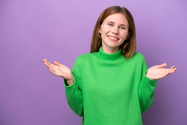 Young English woman isolated on purple background happy and smiling