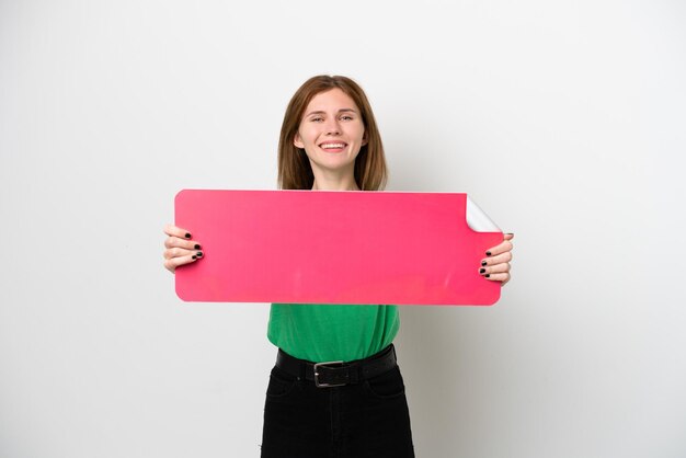 Young English woman isolated on white background holding an empty placard