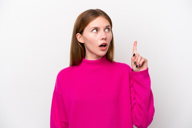 Young English woman isolated on white background thinking an idea pointing the finger up