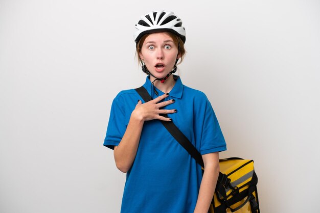 Young English woman with thermal backpack isolated on white background surprised and shocked while looking right