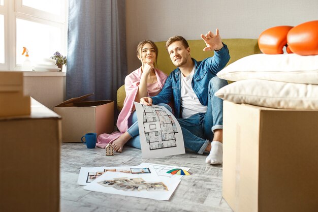 Young family couple bought their first small apartment