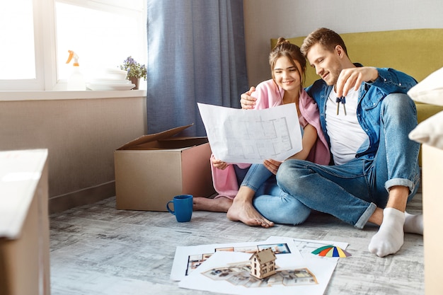 Young family couple bought their first small apartment