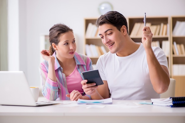 Young family discussing family finances