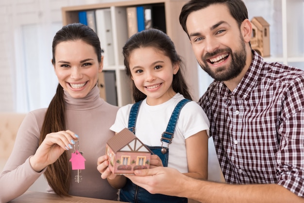 Young family is happy to buy new house