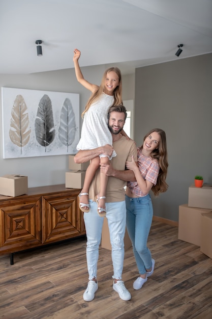 Young family moving into a new house