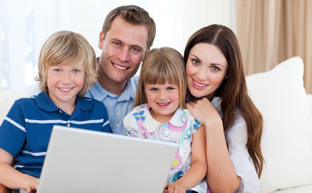 Young family surfing the internet