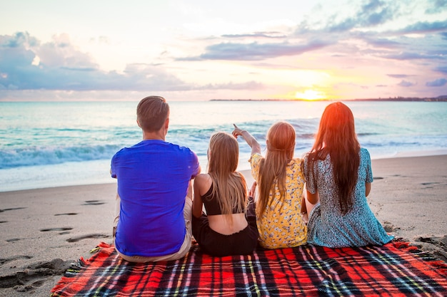 Young family on vacation at the evening