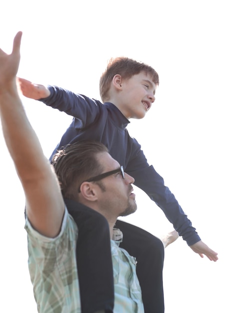 Young father and son have fun and flyphoto with copy space