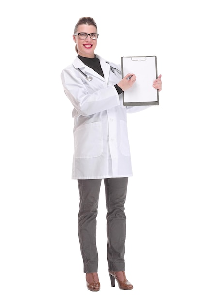 Young female doctor holding empty folder with files of desease illness specialist point by pen blank...