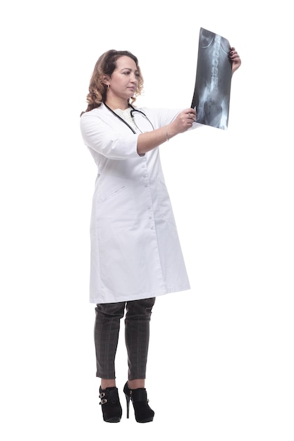 Young female doctor looking at an xray