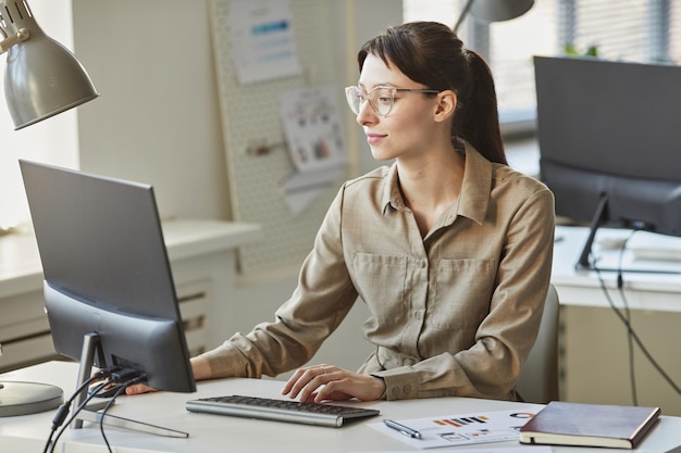 Young Female Entrepreneur At Workplace