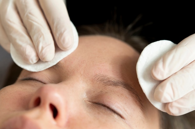 Young female going through a microblading procedure