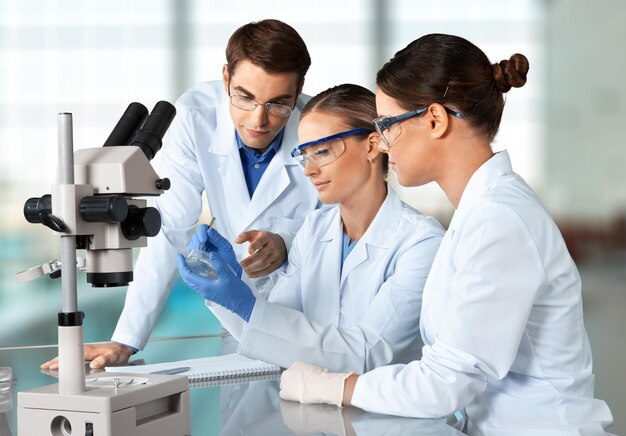 Young female scientist standing in her lab.