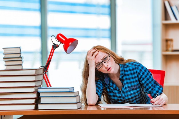 Young female student preparing for exams